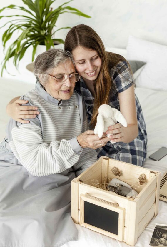 grandmother-checking-old-toys-with-granddaughter