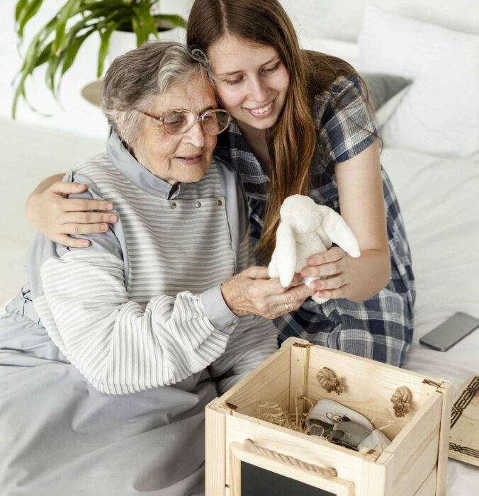 grandmother-checking-old-toys-with-granddaughter